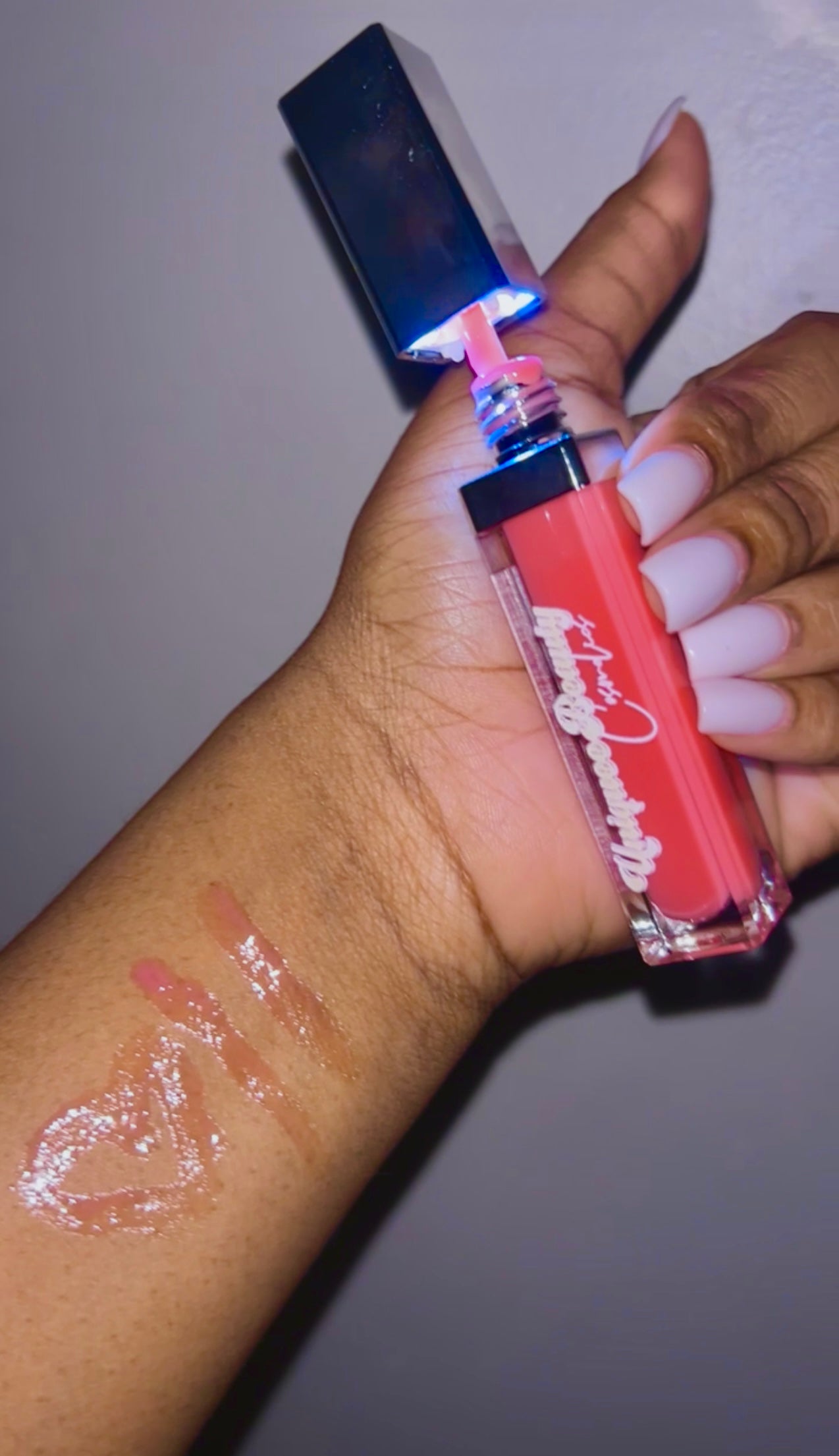 “Just a girl lip gloss”